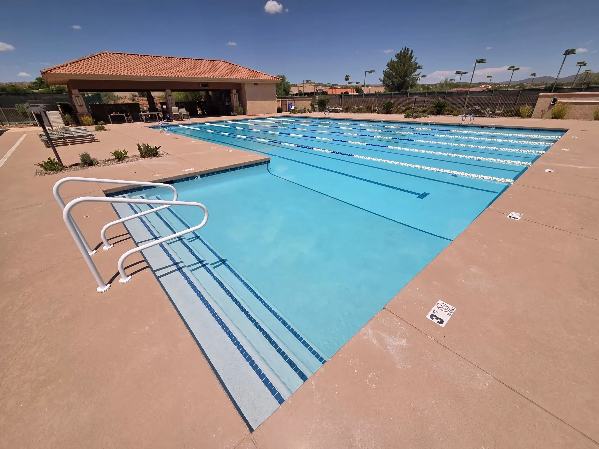 Olympic swimming pool facility desert landscape