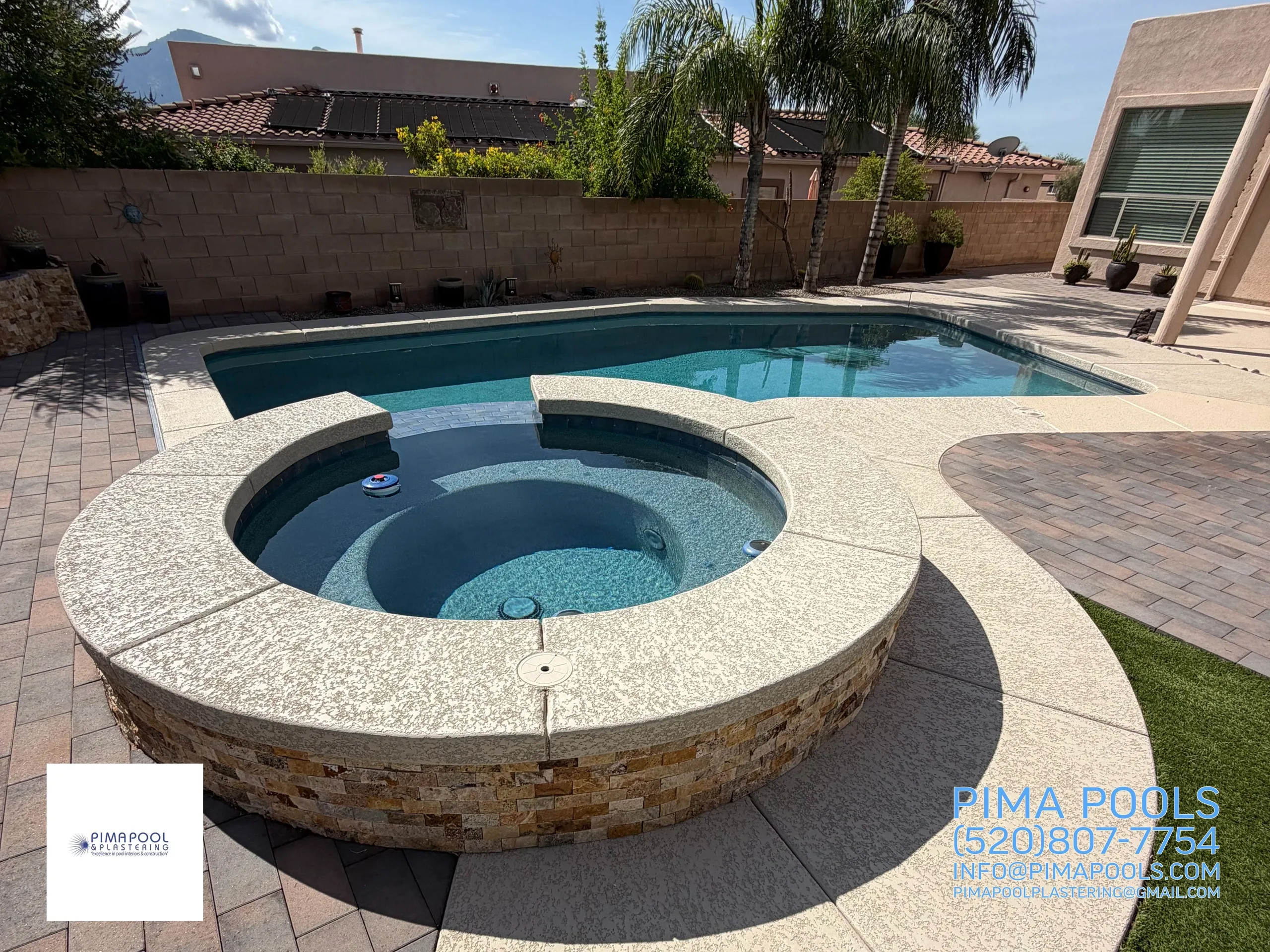 Freeform pool renovation with pebble finish